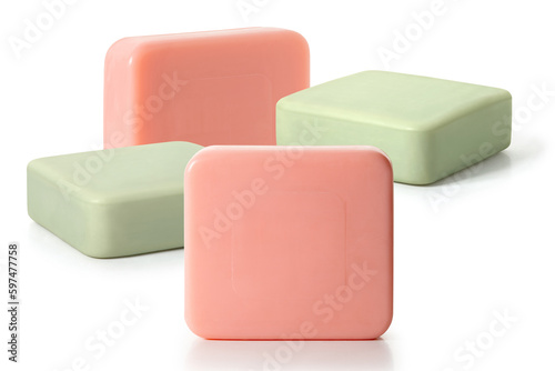 Four pieces of green and pink toilet soap on a white background. Full depth of field. With clipping path
