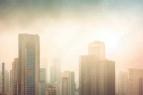 Urban cityscape with tall buildings in foggy atmosphere