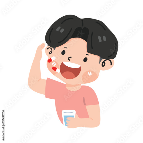 little boy taking medicine capsule with a glass