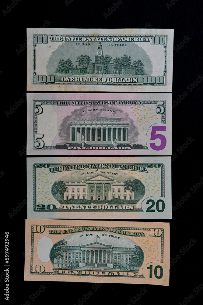 american dollars lie on a black background