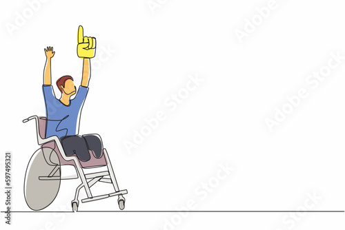 Single one line drawing happy disability young man in wheelchair celebrating winning of football team. soccer fan wheelchair user. Games championship. Continuous line design graphic vector