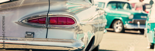 Close up of the tail light of an old american car.