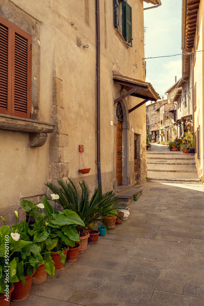 Narrow street in Marta town, Tuscany, Italy