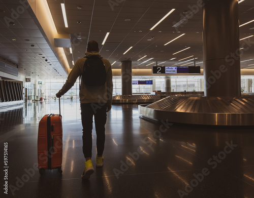 A man at the airport with a suitcase. Journey to Utah. Travel