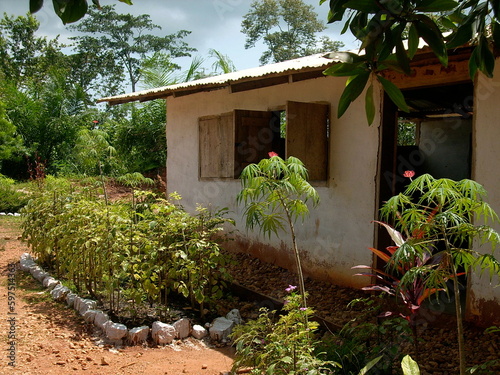 Bild auf Leinwand Traditional single story school, Ghana, with immaculate gardens