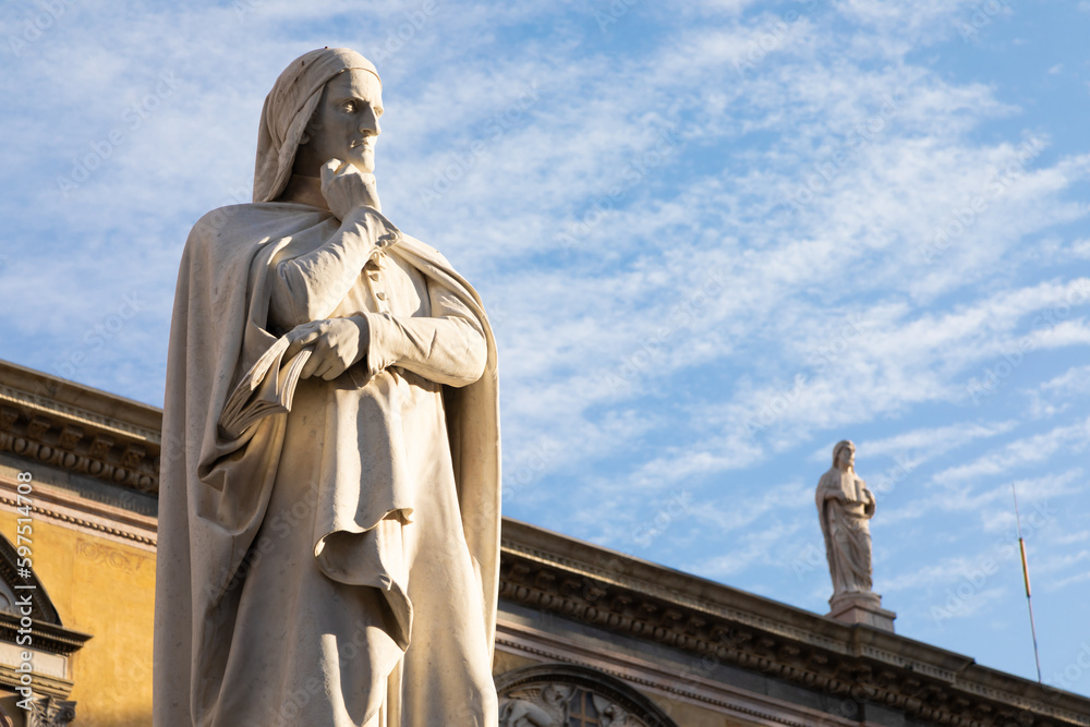 Fototapeta premium Verona, Italy - Dante Alighieri statue, famous poet old sculpture.