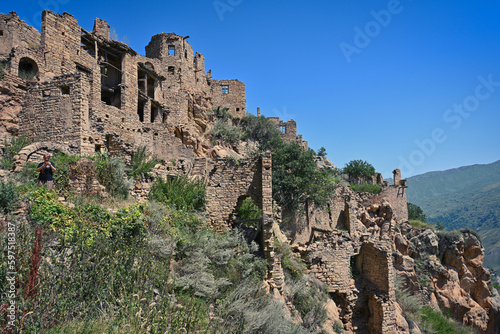 High stone walls of ancient Gamsutl settlement © pdeminhiker