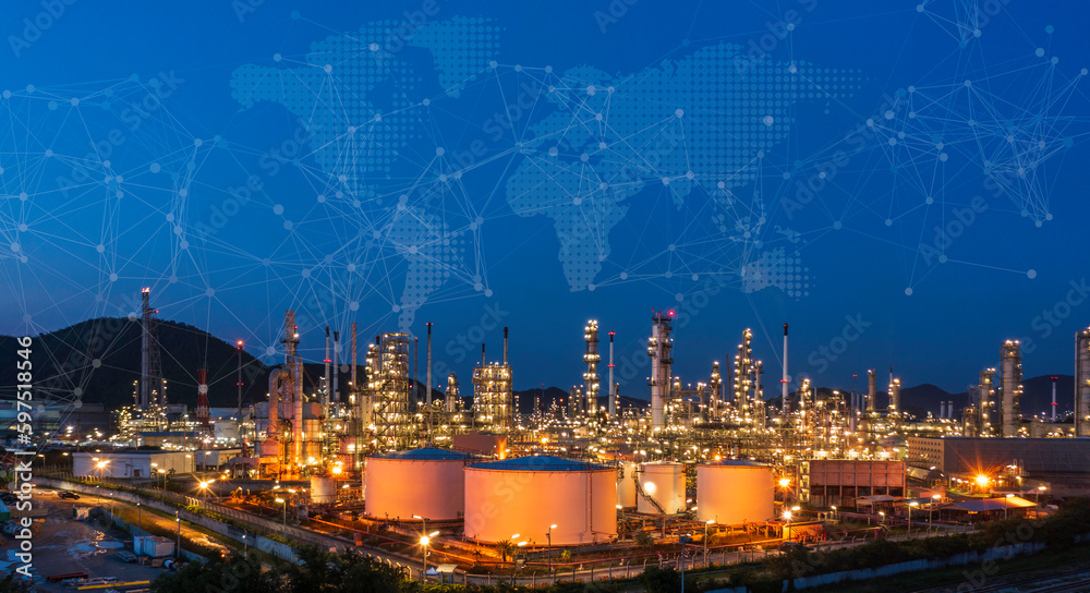 Oil refinery at twilight and night with industrial physical system icon diagram Supports the concept of Industry 4.0 technology..