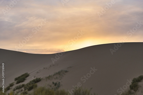 Orange sunset over the Sarykum dune