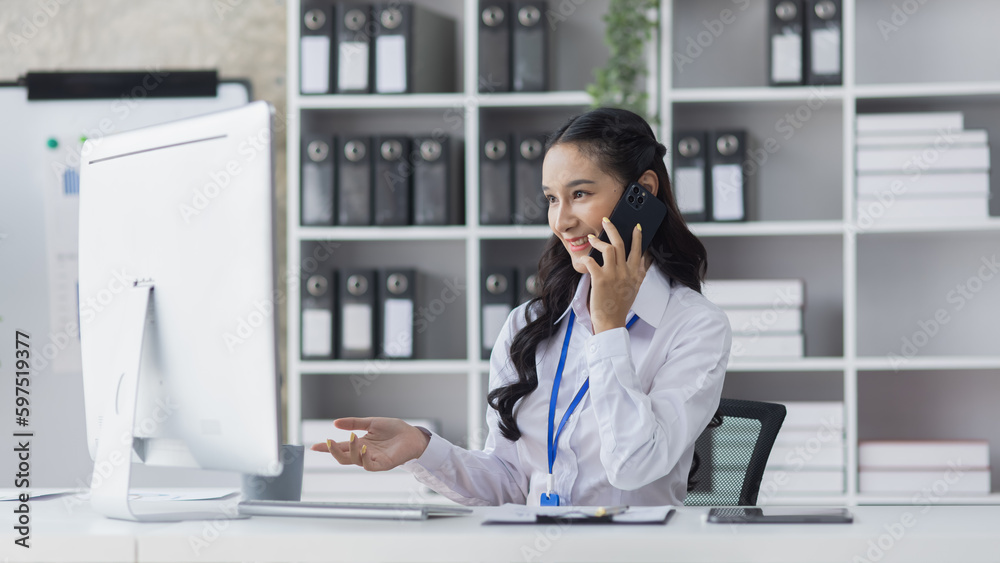 Asian businesswoman working on e-Commerce project marketing, Business and investment finance with growth graph. Asian businesswoman working on e-Commerce project marketing, Business and investment finance with growth graph.