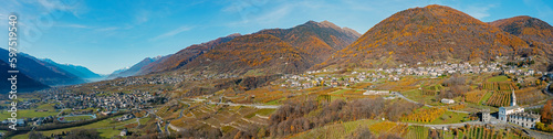 panoramic aerial view of Valtellina in autumn in Chiuro area towards west, Italy