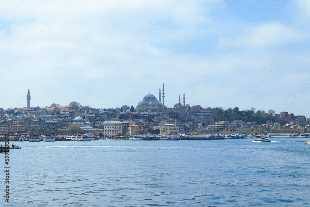Bosporus with an iconic mosque, View of İstanbul with a clear blue sky. Represent Turkish architectur and culture.