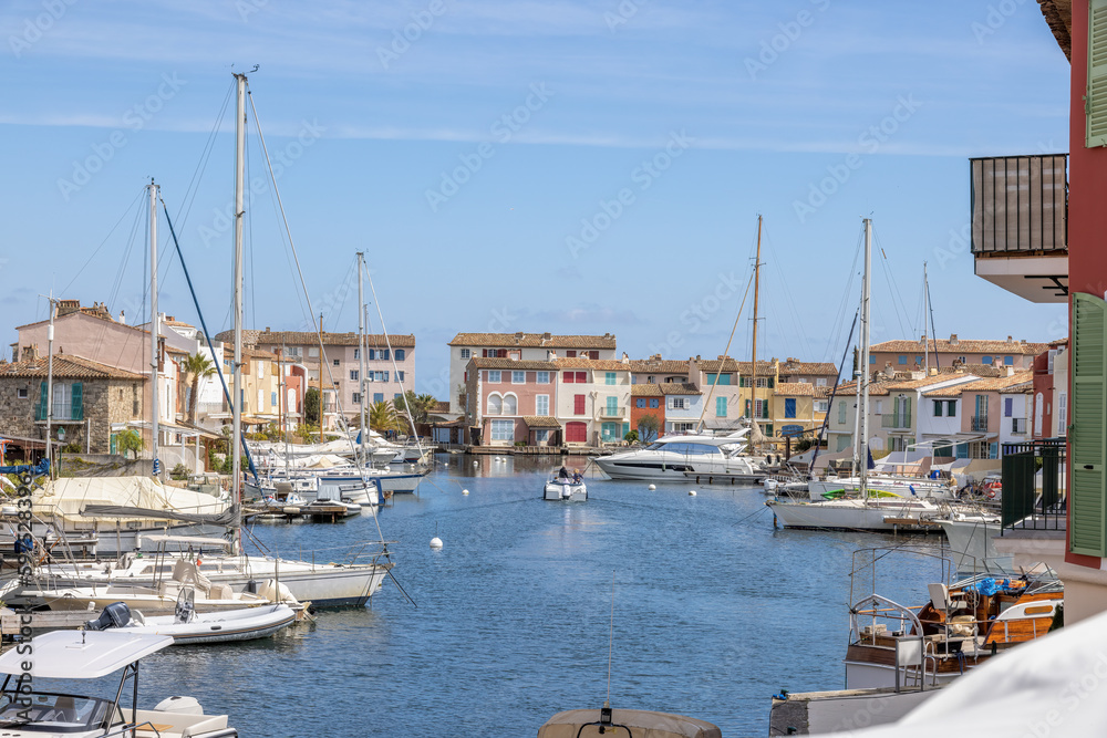 Port Grimaud marina in France in spring with yachts and sailing boats