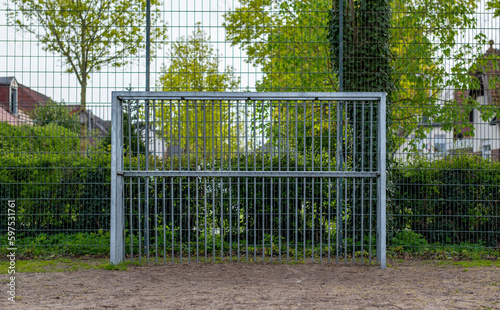An iron football goal in a public park. Street football, free time activities and sports. Championships and tournaments. Street tournaments. Gronau, Germany.