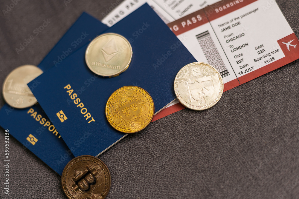 Passport, bitcoin, the airplane background. The concept of travel.