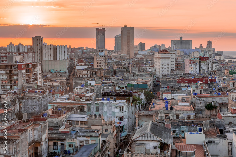 View over the rooftops of Havana in Cuba at sunset with the El National hotel