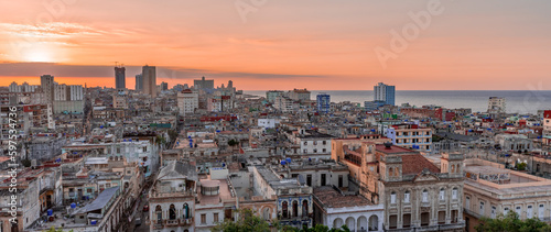View over the rooftops of Havana in Cuba at sunset with the El National hotel