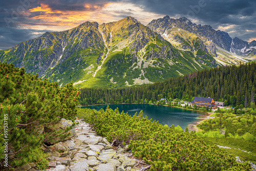 Fototapeta Naklejka Na Ścianę i Meble -  Picturesque panoramic view of Popradske Pleso, Tatra mountains, Slovakia. Lake Popradske pleso with mountain hotel in High Tatras.