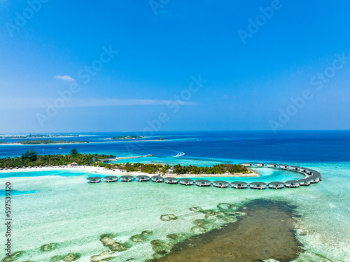 Fototapeta Naklejka Na Ścianę i Meble -  aerial view, Asia, Maldives, North Male Atoll, Kanuhuraa, Cinnamon Dhonveli Maldives, with beaches and water bungalows