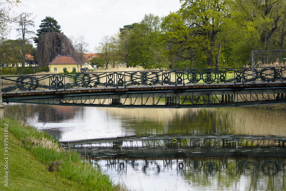 Fototapeta premium Friederiken Bridge over the Graft of the Great Garden in Hanover was created in connection with the creation of the Georgengarten in 1839/40 according to a design by the court architect F. Laves.