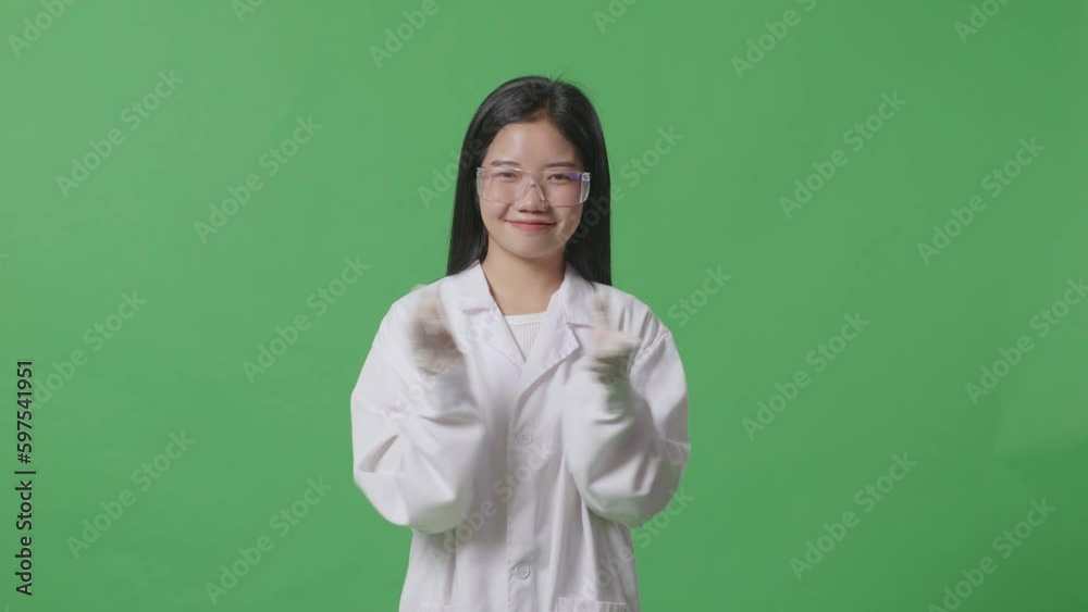 Asian Woman Scientist Smiling And Clapping Her Hands While Standing On The Green Screen Background In The Laboratory
Asian Woman Scientist Smiling And Clapping Her Hands While Standing On The Green Screen Background In The Laboratory