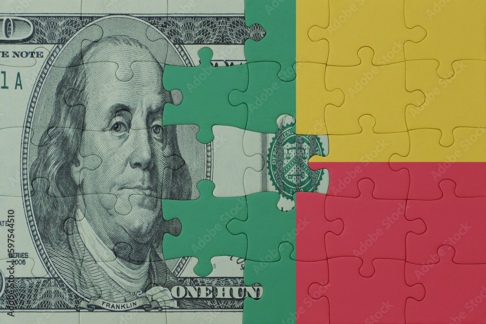 puzzle with the national flag of benin and dollar money banknote. macro.concept.