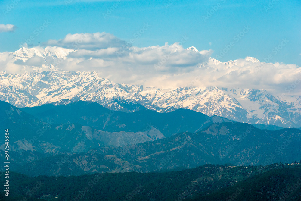 View of the snow capped Himalayan mountain range of Mount Panchachuli in the village of Kausani in Uttarakhand.