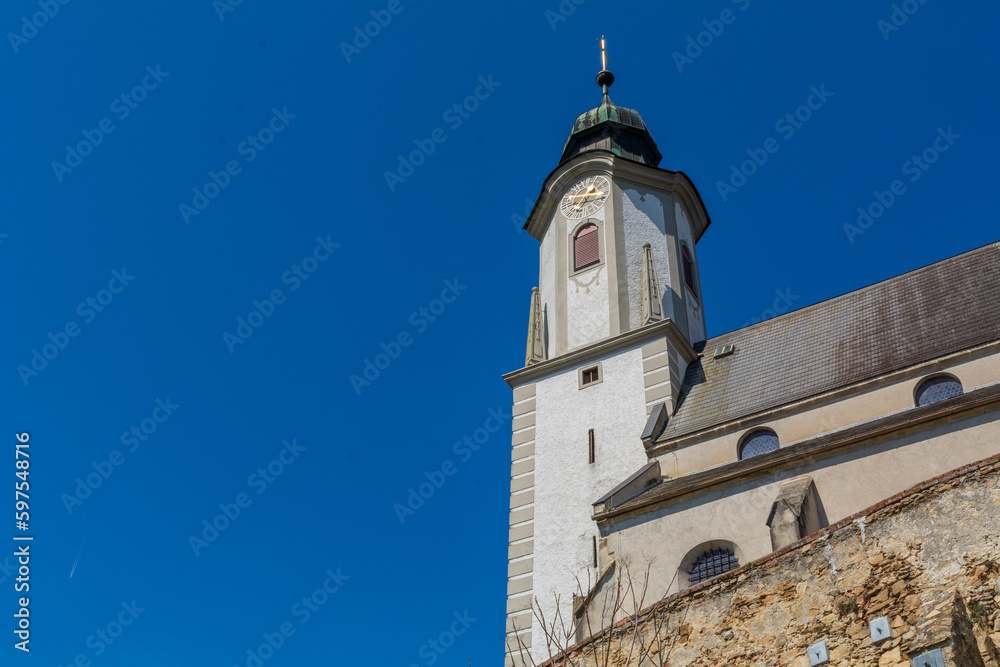 Low-angle view of a church against a blue sky