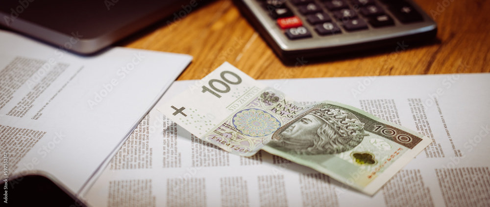 Table with documents and money - Polish currency - horizontal 