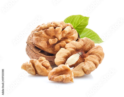 Walnuts with leaves on white background