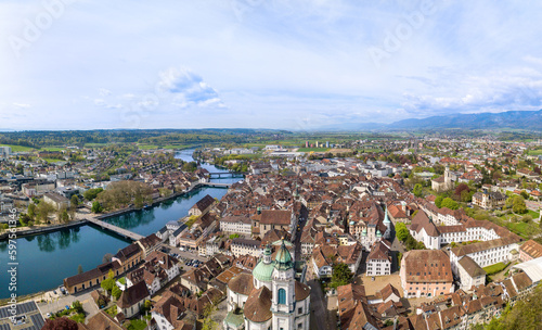 Obraz na płótnie Panorama of aerial views of the old town of Solothurn city with St. Ursus Cathedral - a Swiss heritage site of national significance - at the foreground and the Aare River on the left. w salonie