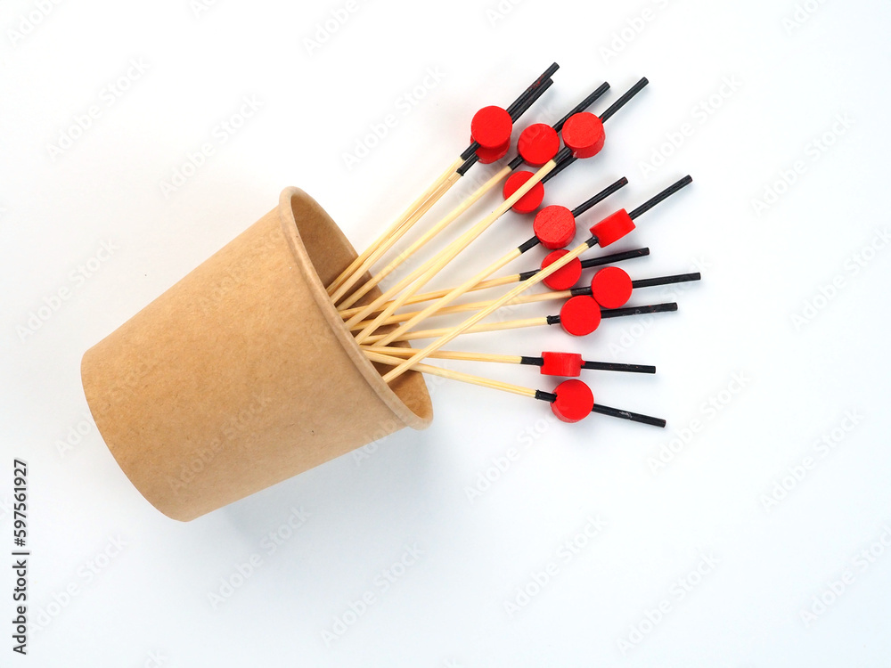 Top view of wooden skewers for canape and glass of kraft paper Top view of wooden skewers for canape and glass of kraft paper