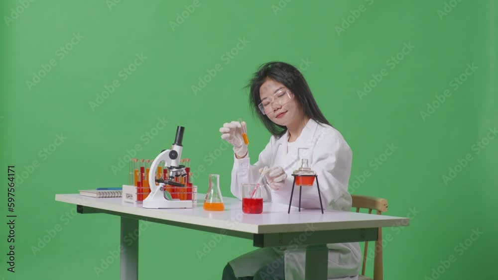 Side View Of Crazy Asian Woman Scientist Making Experiment With Test Tube And Screaming Goal Celebrating While Working On The Table With Microscope In The Green Screen Background Laboratory
Side View Of Crazy Asian Woman Scientist Making Experiment With Test Tube And Screaming Goal Celebrating While Working On The Table With Microscope In The Green Screen Background Laboratory