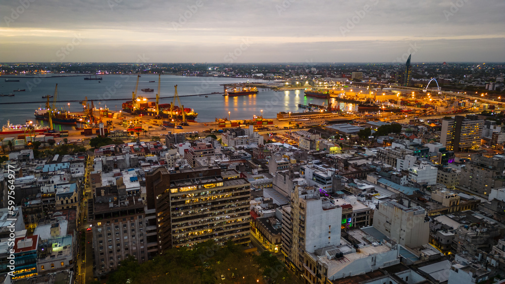 aerial view Montevideo, Uruguay industrial container shipping port illuminated at night