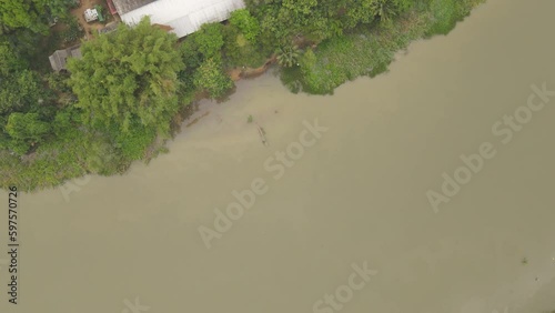 High-Angle Video of the Merit Making Ceremony, Buddhist Monk Ordination, Surat Thani Province, Near Tapee River photo