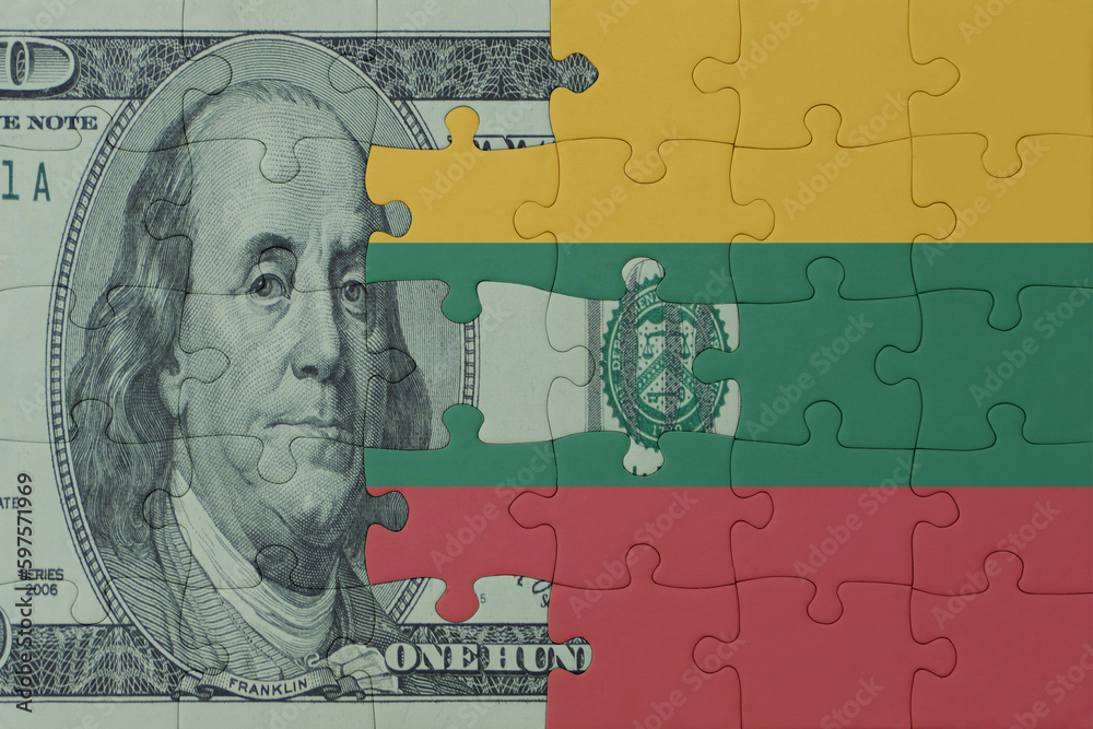 puzzle with the national flag of lithuania and dollar money banknote. macro.concept.