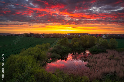 Amazing sunset over the spring fields of Rotmanka  Poland