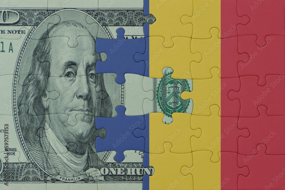 puzzle with the national flag of romania and dollar money banknote. macro.concept.