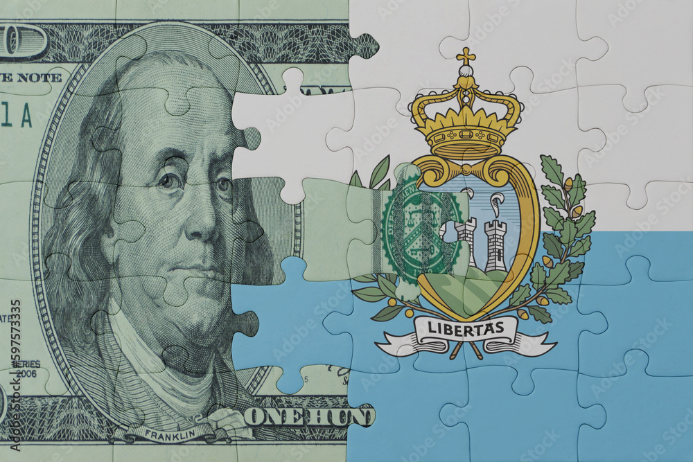 puzzle with the national flag of san marino and dollar money banknote. macro.concept.