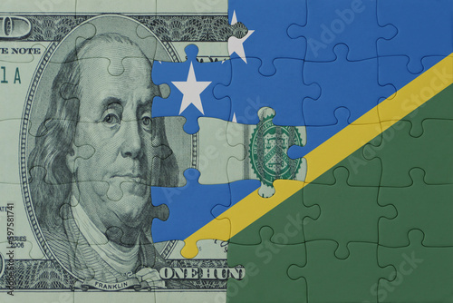 Wallpaper Mural puzzle with the national flag of Solomon Islands and dollar money banknote. macro.concept. Torontodigital.ca