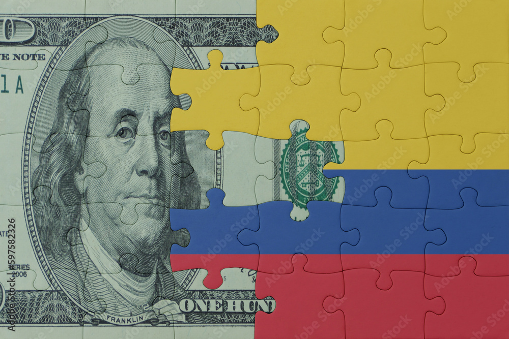 puzzle with the national flag of colombia and dollar money banknote. macro.concept.