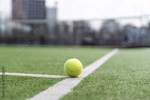 tennis ball on tennis grass court © Angelov