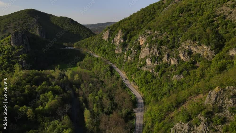 car drive on asphalt road in mountain range in spring travel concept car drive on asphalt road in mountain range in spring travel concept