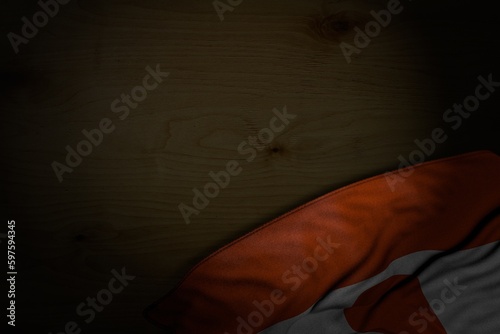 pretty holiday flag 3d illustration. - dark picture of Niger flag with big folds on dark wood with empty space for your content