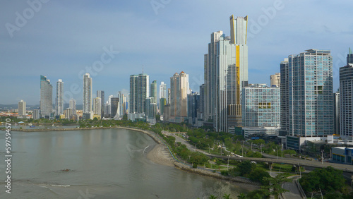 Sunlight shines on tall skyscrapers of Panama City's modern financial district © helivideo