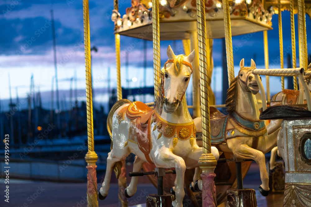 Carousel with figures of horses
