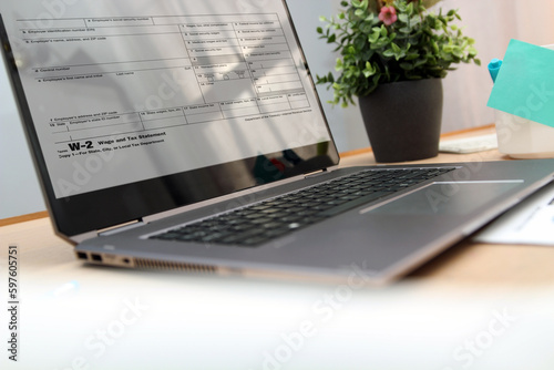 Business person  is prepairing  for taxes. Tax return.