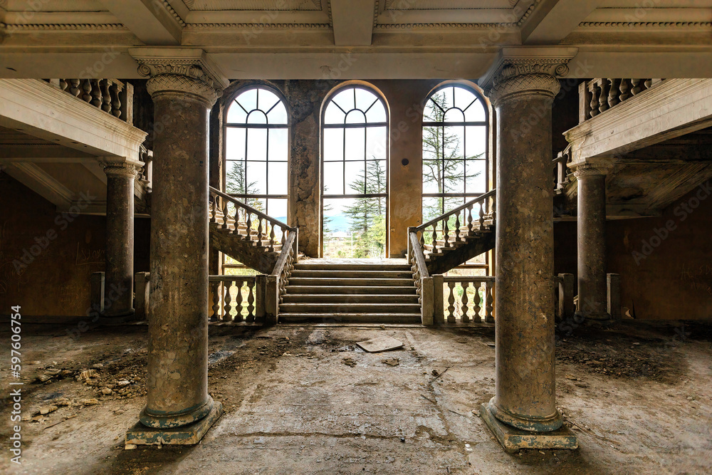 Large entrance hall with columns in old abandoned mansion, Sanatorium Imereti, Tskaltubo
