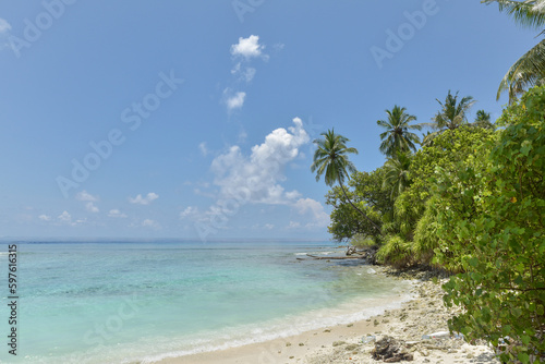 Beautiful tropical Maldives island with white sandy beach and sea