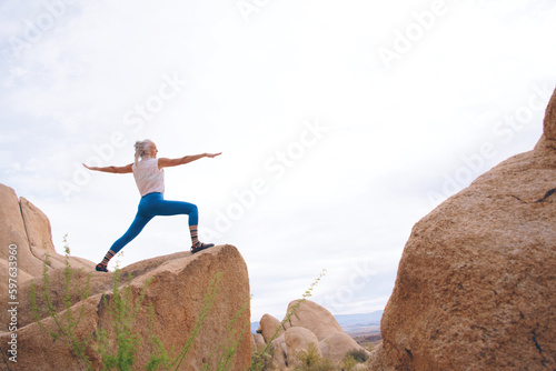 Senior Woman in the desert expressing wellness and heath. 